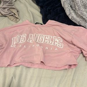 pink cropped top